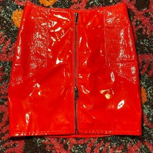 Red zip up “plastic” material skirt